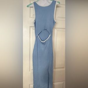 A university blue midi summer dress with slit on belly.